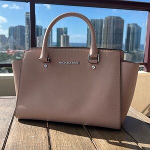 Barely used light pink Michael Kors handbag.